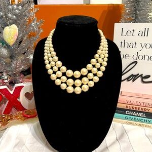 Vintage 3 strand faux pearls with silver details . EUC